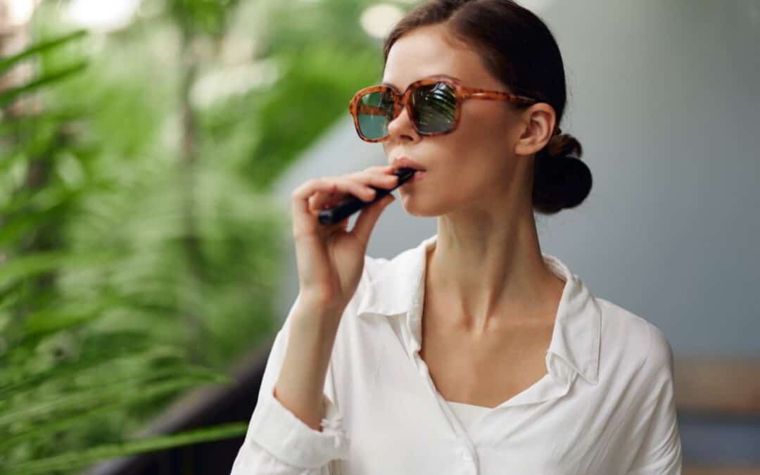 woman enjoying a nad vitamin vape pen