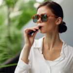 woman enjoying a nad vitamin vape pen